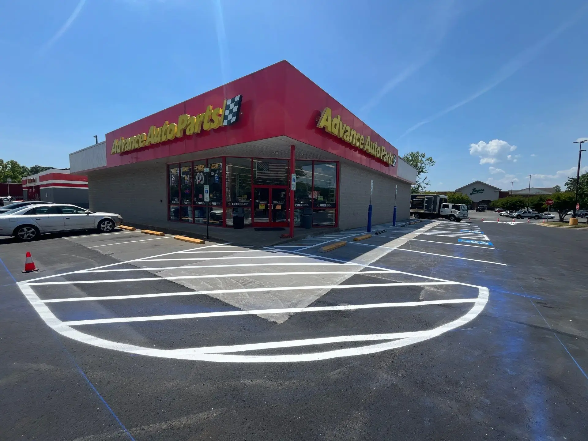 Resurfaced and striped Advance Auto Parts lot