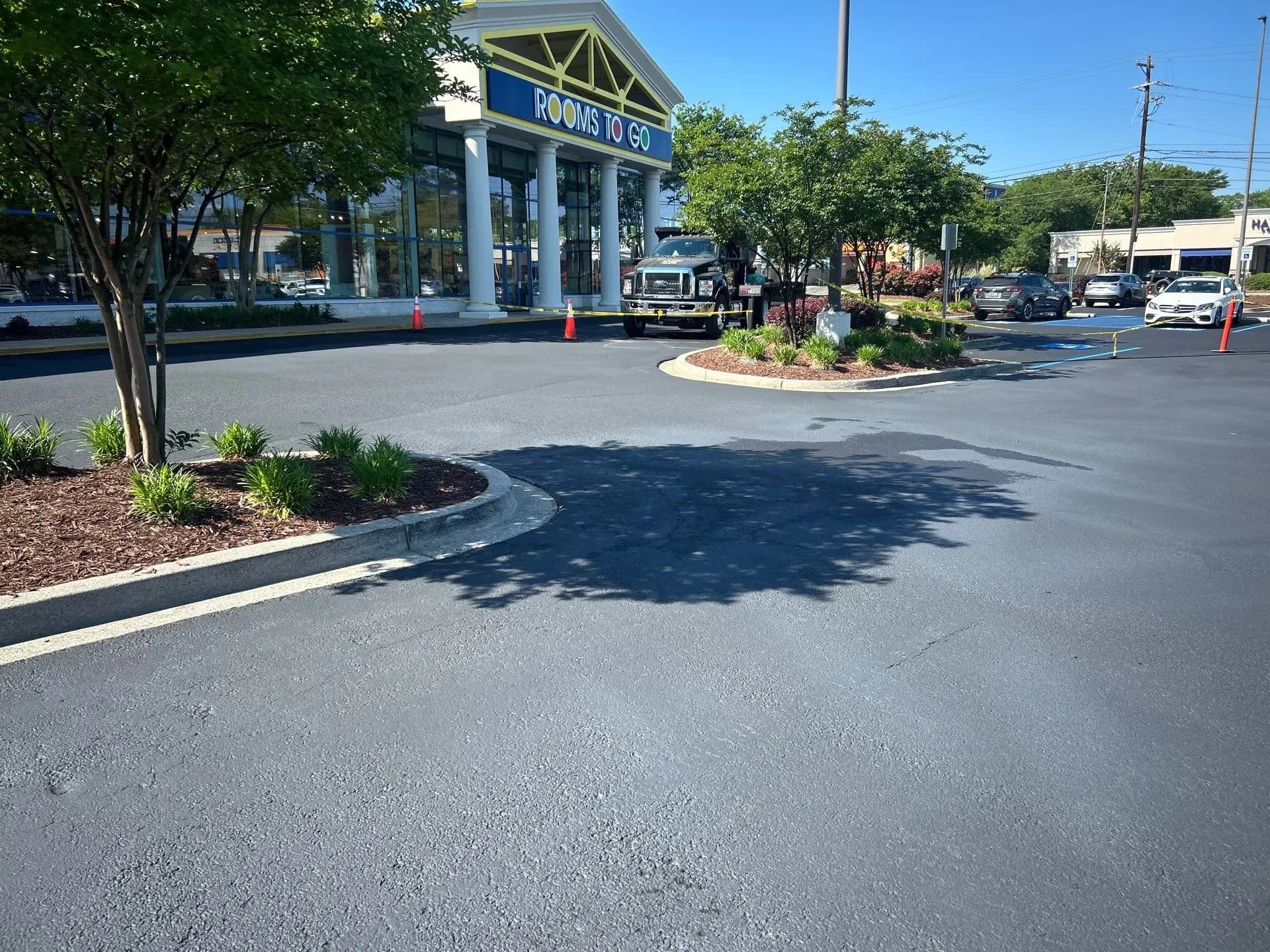 Seal coated surface across a commercial parking lot