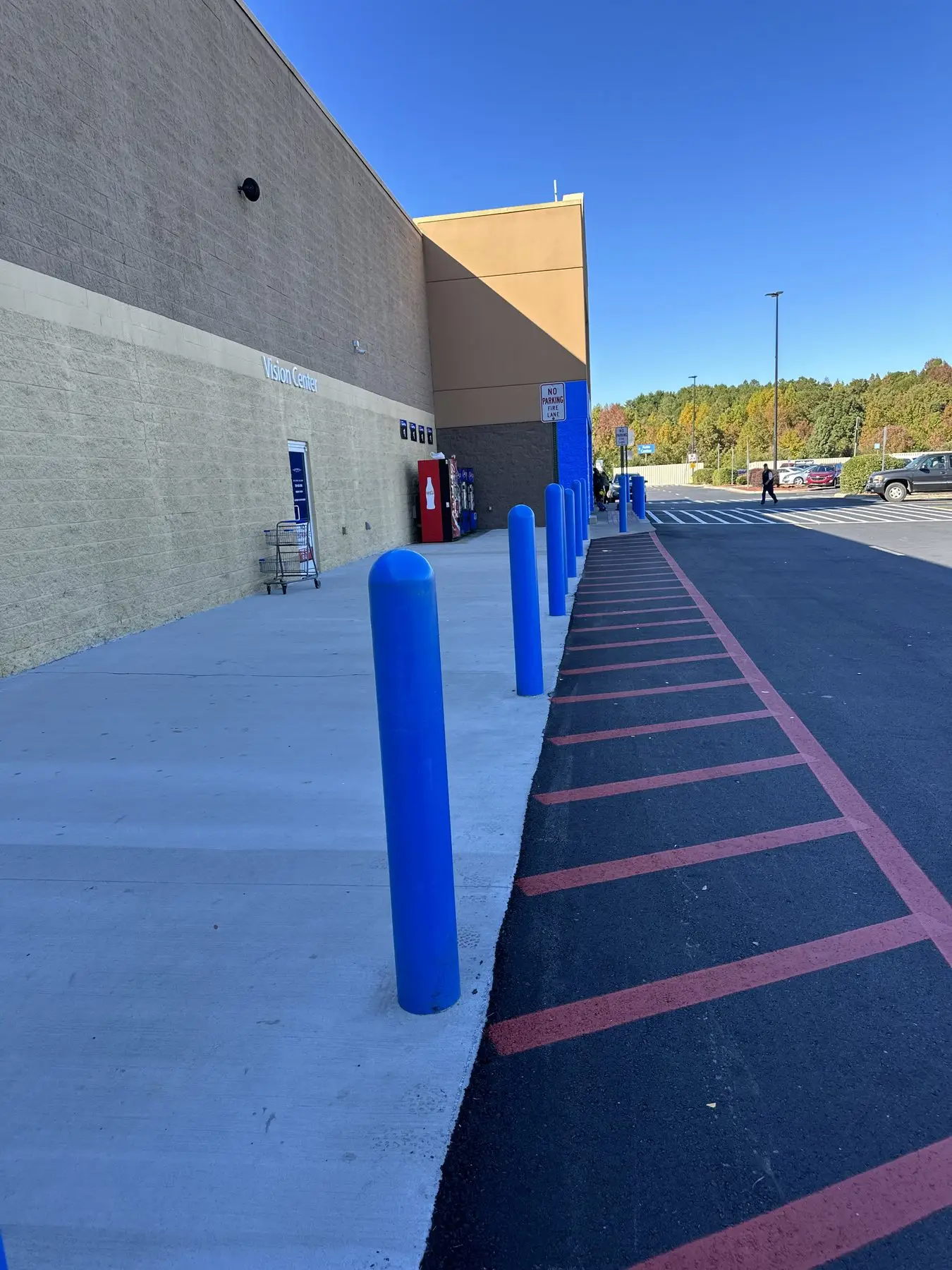 Bollards installed and painted at the storefront