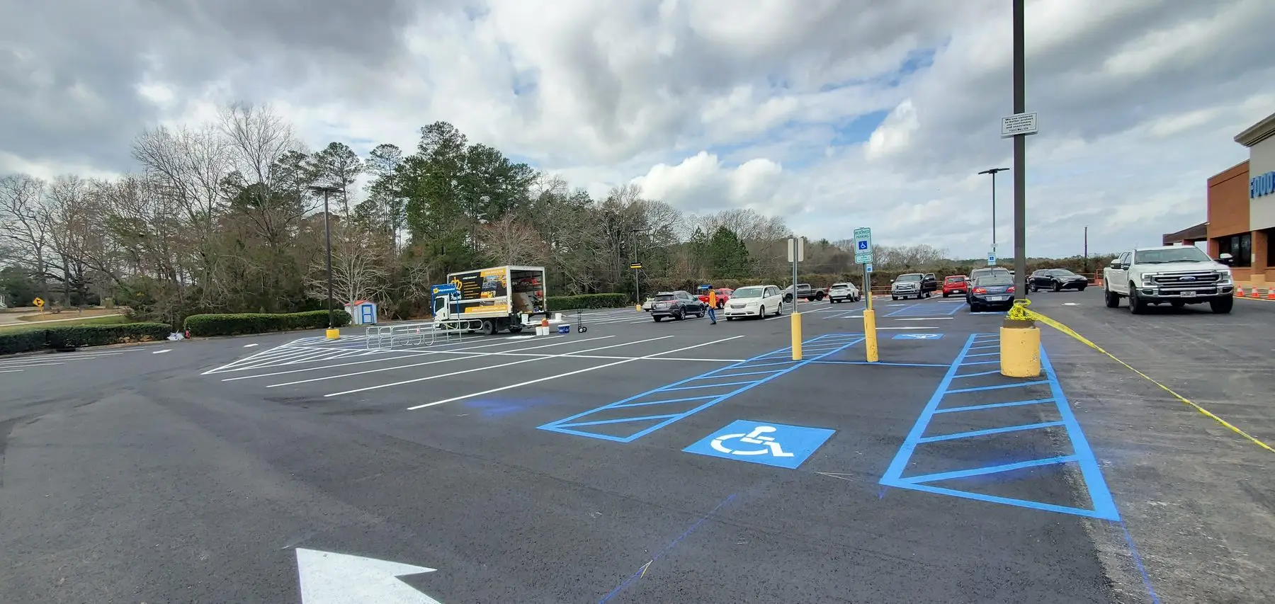 Completed ADA stall and striping at a Food Lion store