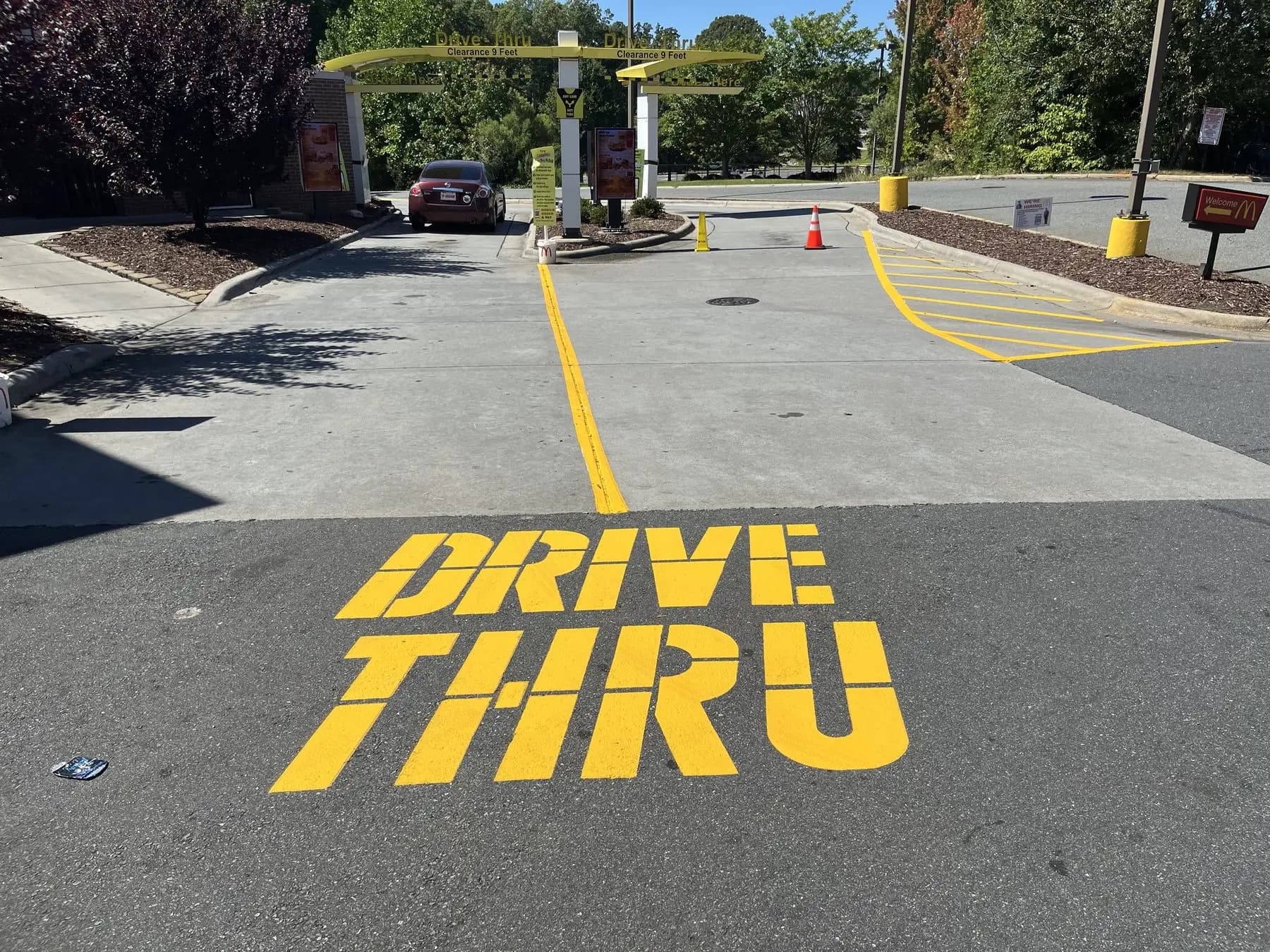 Drive-through lettering painted on the lane at a McDonald’s