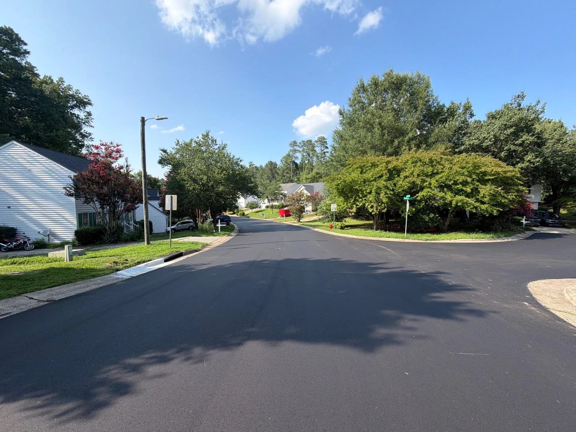 Newly resurfaced street surface and kerb line in Durham, NC
